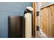 Exterior shot featuring water softener system on the side of the home near the wood gate at 3983 Shay Dr, Bartow, FL 33830