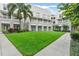 Inviting exterior with a well-manicured lawn, complemented by classic building design and vibrant landscaping at 539 Water St # 539, Kissimmee, FL 34747