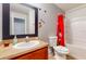 Bright bathroom with decorative accents, vanity, and shower/tub combo at 5494 Paradise Cay Cir, Kissimmee, FL 34746