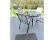 Private outdoor patio with table and chairs. The perfect spot to unwind! at 5494 Paradise Cay Cir, Kissimmee, FL 34746