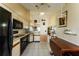 Bright kitchen with modern appliances, tiled floors, ample cabinet space, and convenient layout at 62 Lakepointe Cir, Kissimmee, FL 34743