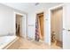 Bathroom featuring a corner soaking tub and a separate shower, plus a walk-in closet at 124 Pangola Dr, Winter Haven, FL 33880