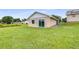 Charming detached home features a serene setting with sliding glass doors to the backyard at 124 Pangola Dr, Winter Haven, FL 33880
