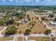 Beautiful aerial perspective of estate highlighting its acreage, mature trees, and serene setting at 4145 Willis Rd, Mulberry, FL 33860