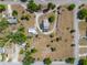 Bird's eye view of the property with a circular driveway and large grassy areas at 4145 Willis Rd, Mulberry, FL 33860