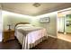 Cozy bedroom with hardwood floors, recessed lighting, and a double bed at 4145 Willis Rd, Mulberry, FL 33860