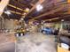 Spacious garage featuring high ceilings, open layout, and ample storage space perfect for projects and organization at 4145 Willis Rd, Mulberry, FL 33860