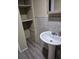 Bathroom featuring a pedestal sink with a built in shelf at 12828 Sw 49Th Ter, Webster, FL 33597