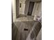 Open living space with linoleum floors, showcasing the room's layout and potential at 12828 Sw 49Th Ter, Webster, FL 33597