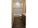 Stylish bathroom featuring tiled shower with tub, granite vanity, and wood-look flooring at 19041 Mardi Gras St, Orlando, FL 32833