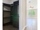 Walk-in closet with custom shelving and storage solutions at 19041 Mardi Gras St, Orlando, FL 32833