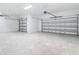 Spacious two-car garage with painted floor at 19041 Mardi Gras St, Orlando, FL 32833