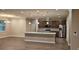 Spacious kitchen featuring granite countertops, stainless steel appliances, an island, and ample cabinetry at 19041 Mardi Gras St, Orlando, FL 32833
