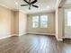 Living room with hardwood floors, ceiling fan and natural light at 19041 Mardi Gras St, Orlando, FL 32833