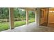 Covered patio overlooking landscaped backyard with lush greenery at 19041 Mardi Gras St, Orlando, FL 32833