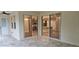 Patio with tile flooring and view of kitchen and living areas at 19041 Mardi Gras St, Orlando, FL 32833