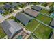 An aerial view of a home and fenced backyard with a grass lawn at 2576 Boots Rd, Lakeland, FL 33810