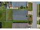 An aerial view of a home with a large, well-maintained lawn and a driveway leading to the street at 2576 Boots Rd, Lakeland, FL 33810