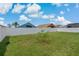Fenced backyard with ample lawn space and room to roam at 2576 Boots Rd, Lakeland, FL 33810