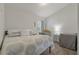 Bedroom featuring neutral colors, a window for natural light, and a comfortable bed at 2576 Boots Rd, Lakeland, FL 33810