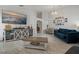 Bright living room features high ceilings, tile floors, and modern decor at 2576 Boots Rd, Lakeland, FL 33810