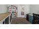 A home office features a bookshelf, a desk, and neutral tones creating a productive space at 2576 Boots Rd, Lakeland, FL 33810