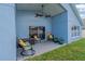 Covered patio featuring outdoor seating and ceiling fan at 2576 Boots Rd, Lakeland, FL 33810