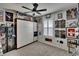 Bedroom with an array of interesting decor, a murphy bed and modern shuttered window at 3628 Diving Dove Ln, Bartow, FL 33830