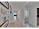 Bright and airy entryway with tiled flooring leading to the living spaces and bedrooms at 3628 Diving Dove Ln, Bartow, FL 33830