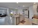Spacious kitchen island with granite countertops, perfect for food preparation and casual dining at 3628 Diving Dove Ln, Bartow, FL 33830