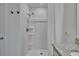 Clean shower with updated shower head and granite countertops at 3628 Diving Dove Ln, Bartow, FL 33830