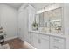 Bright bathroom with double vanity and gold fixtures at 9419 Alturas Babson Park Cutoff Rd, Bartow, FL 33830