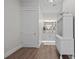 Bathroom featuring a white door, vanity, chandelier and glass shower at 9419 Alturas Babson Park Cutoff Rd, Bartow, FL 33830