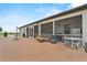 Expansive outdoor deck area perfect for entertaining and relaxation, featuring ample seating and open views at 9419 Alturas Babson Park Cutoff Rd, Bartow, FL 33830