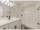 Modern bathroom featuring a sleek vanity, updated fixtures, and a walk-in shower for a clean aesthetic at 1856 Laredo Dr, Deltona, FL 32738