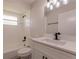 Modern bathroom with white vanity, matte black fixtures, and shower-tub combination at 1856 Laredo Dr, Deltona, FL 32738