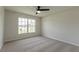 Bright bedroom with a large window offering plenty of natural light at 1856 Laredo Dr, Deltona, FL 32738