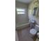 Charming bathroom featuring a combination tub and shower, tile floors, and vintage fixtures at 2506 Bonneville Dr, Orlando, FL 32826