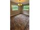 Well lit dining room with brick flooring and a classic chandelier adding warmth to the space at 2506 Bonneville Dr, Orlando, FL 32826