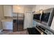 Well-equipped kitchen featuring stainless steel appliances and ample cabinet space at 2506 Bonneville Dr, Orlando, FL 32826