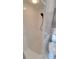 Simple, clean shower stall with white tile and a modern black showerhead, practical and functional at 2506 Bonneville Dr, Orlando, FL 32826