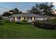 Charming home with well-manicured lawn and landscaping at 5402 Rosewall Cir, Leesburg, FL 34748