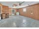 Spacious garage with laundry area and ample storage space at 5402 Rosewall Cir, Leesburg, FL 34748
