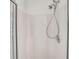 Modern shower stall features adjustable shower head and sleek design at 5402 Rosewall Cir, Leesburg, FL 34748