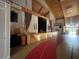 A versatile stage and performance area with wood accents, tiered levels, and potential for various events at 5402 Rosewall Cir, Leesburg, FL 34748
