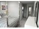 View of the bedroom from an interesting angle with a glimpse into the hallway beyond at 1319 Heavenly Cv, Winter Park, FL 32792