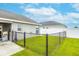 Cozy fenced-in backyard space; great for pets and private relaxation or entertainment at 2053 Charleston Ln, Bartow, FL 33830