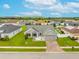 Charming home with a well-kept lawn, inviting front porch, and a two-car garage at 2053 Charleston Ln, Bartow, FL 33830