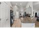 Galley style kitchen with stainless steel appliances, granite countertops, and streamlined cabinets at 2053 Charleston Ln, Bartow, FL 33830