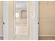 Hallway view of bathroom featuring a soaking tub, shower, and tile floors at 2645 Sw 148Th Ln, Ocala, FL 34473